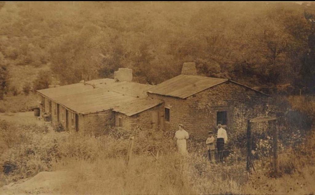 The famous Wootton house, pictured with 'Uncle Dick' and his family. [source](https://www.legendsofamerica.com/we-richenswootton/)